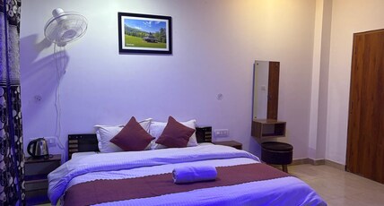 Hotel Snow Crest Residency  | A Pure Veg Hotel Room Type - Family Room with Balcony