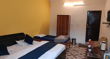 Hotel Omkaar & Restaurant Room Type - Deluxe Triple Non AC Room