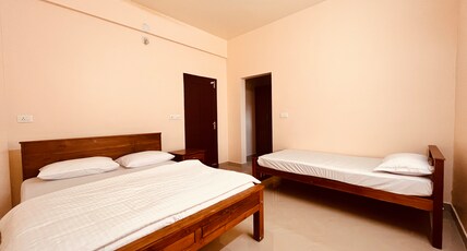 Pathyil Moonberg Holiday Apartment Room Type - Deluxe Garden View room with dressing room and En Suite Bath Pathyil Moonberg Holiday Apartment Room Type - Deluxe Garden View room with dressing room and En Suite Bath