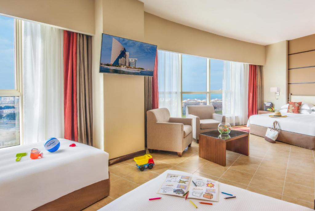 Khalidiya Palace Rayhaan by Rotana - Tap to explore photos