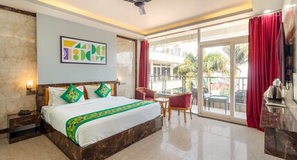 Treebo Arya Palace With Swimming Pool Room Type - Deluxe Room with Pool View