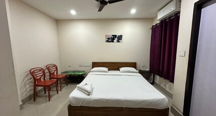 The Dew Drop Hotel Room Type - Deluxe room
