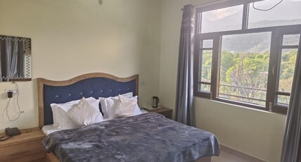 Hotel Shani (Punjabi Rasoi) Room Type - Standard Room with Hills View Hotel Shani (Punjabi Rasoi) Room Type - Standard Room with Hills View