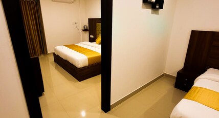 Thejaswini Residency Room Type - King Room Two Double Bed