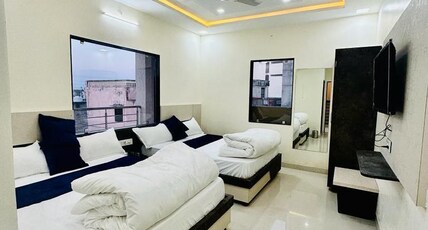 HOTEL PUJARI Room Type - EXECUTIVE FAMILY ROOM