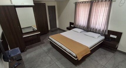 HOTEL SIDDAGANGA Room Type - Deluxe AC Room