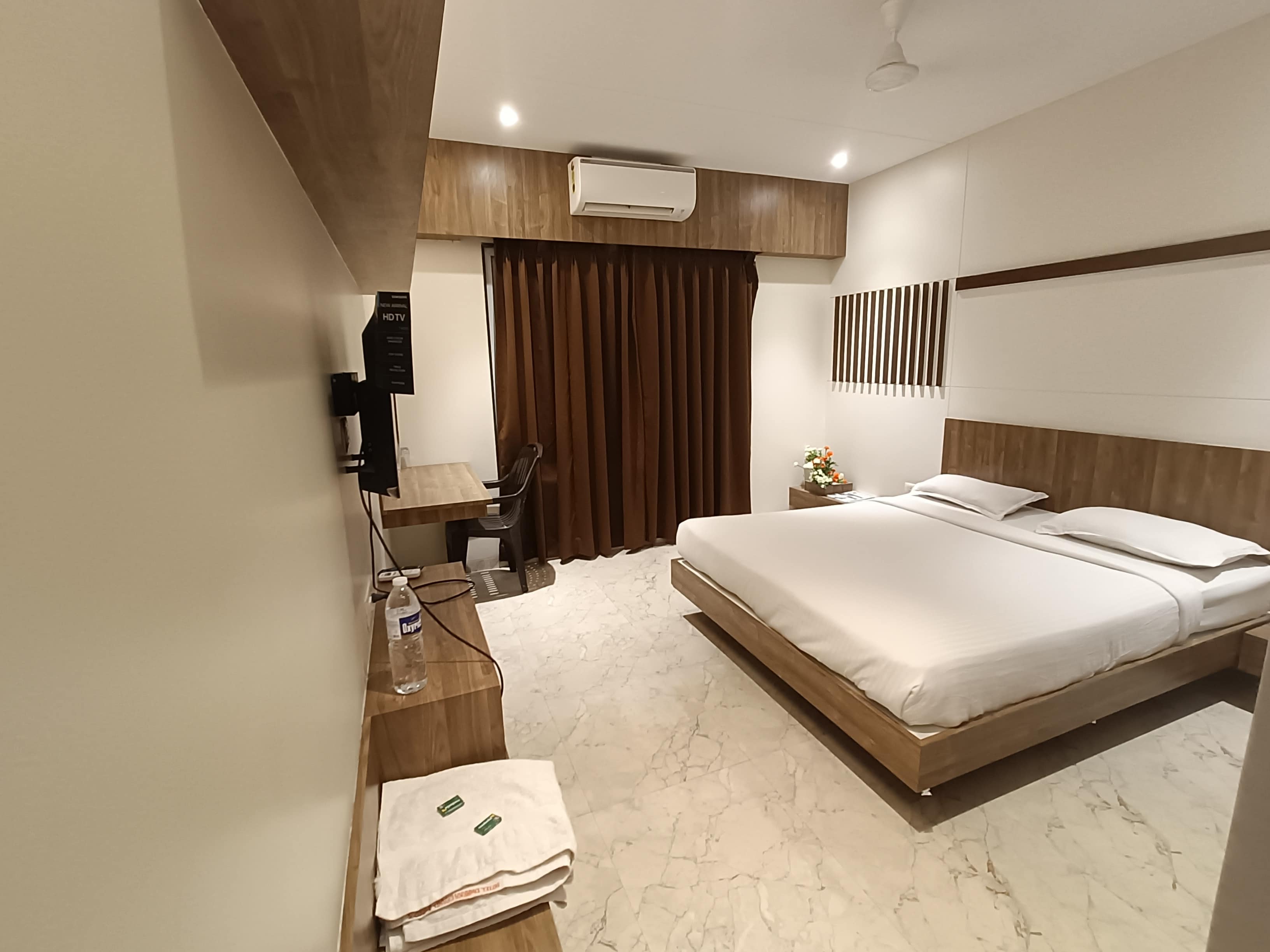 Hotel Dwarka Grand - Tap to explore photos