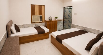 Tripathi's Rampath Inn | Near Rammandir Room Type - Twin bedroom AC