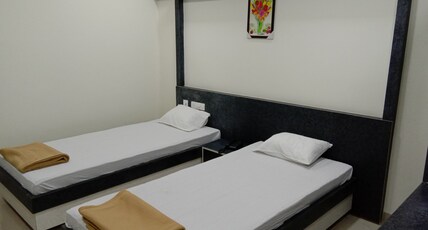 PRESTIGE INN Room Type - Deluxe Twin Bed Non AC Room