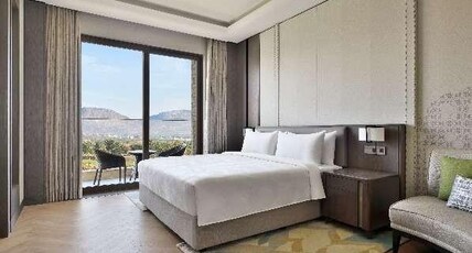 JW Marriott Bengaluru Prestige Golfshire Resort and Spa Room Type - Luxury Suite, Executive lounge access, Suite, 1 King, Golf view, Balcony