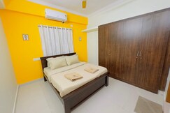 Yellow Delight 2BHK Themed flat near US Consulate