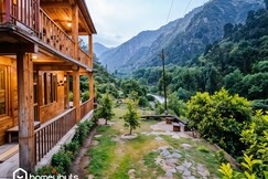 Rustic River View Cottage Tirthan by Homeyhuts