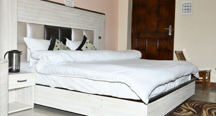 Sweet Basil Hotel and Restaurant Room Type - Deluxe Room Non AC