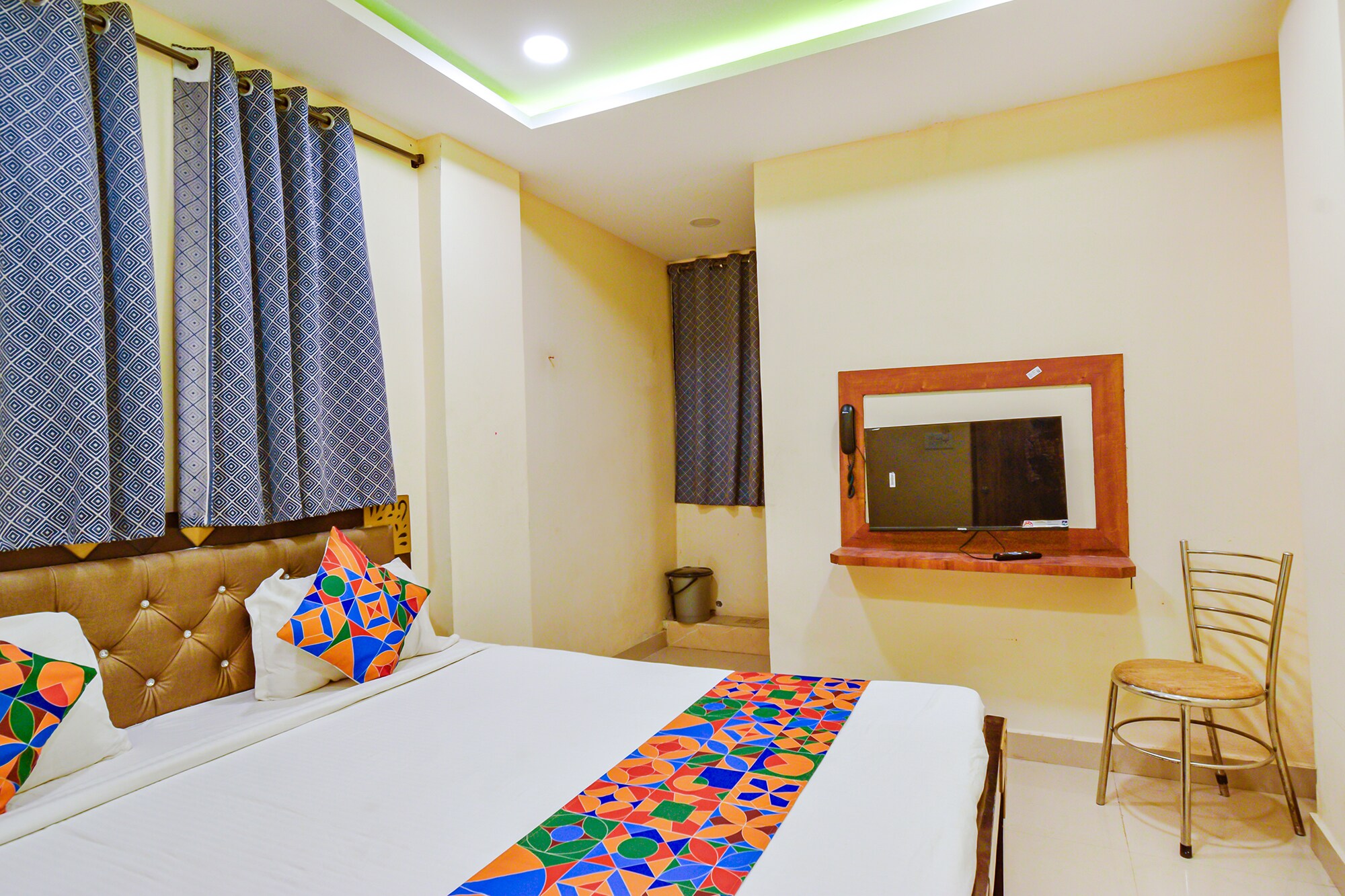 FabHotel Yogeshwara Grand - Tap to explore photos