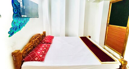 Aura Residency Room Type - Doulble cot deluxe AC..
