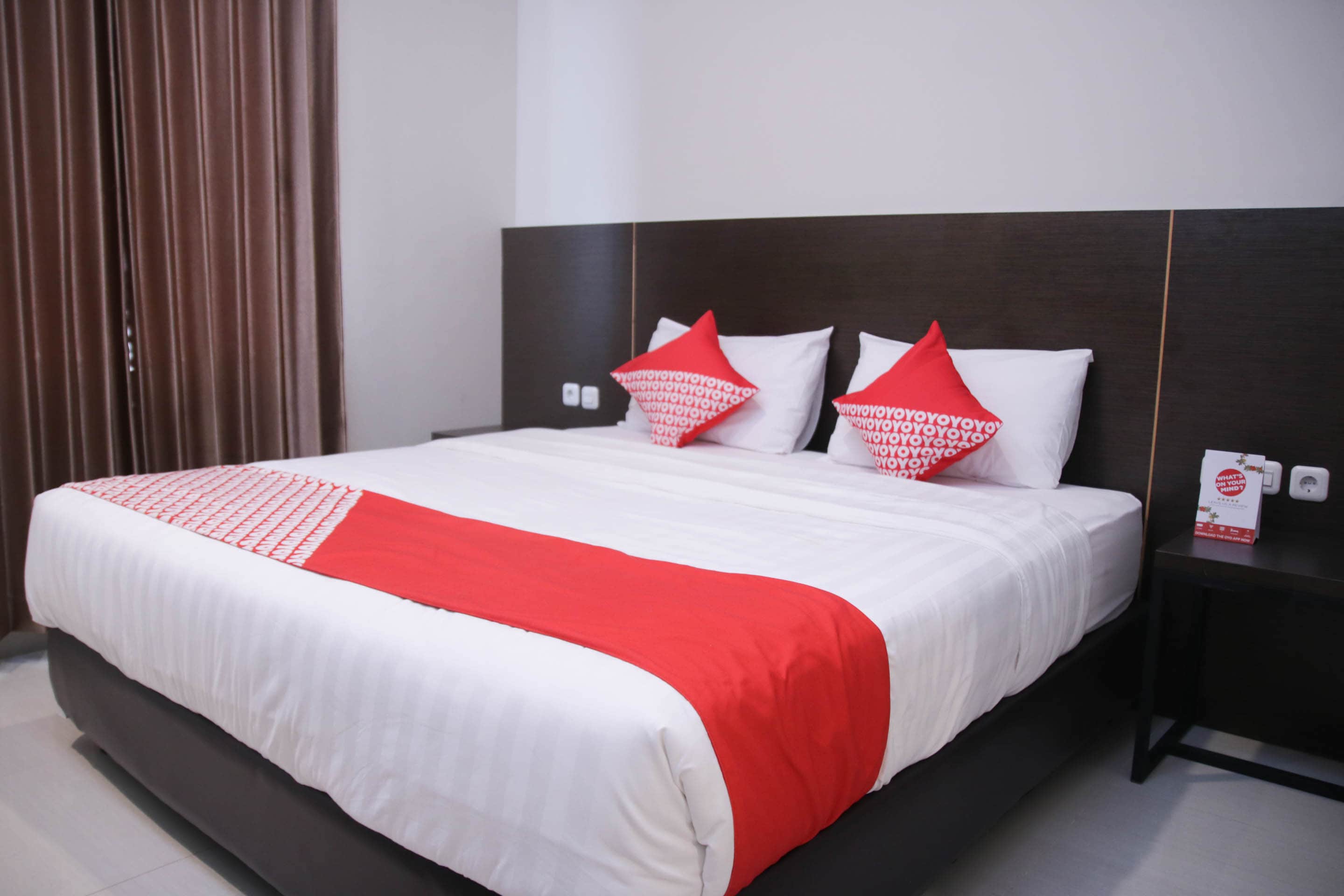 Hotel O Azzahra Guest House Syariah - Tap to explore photos