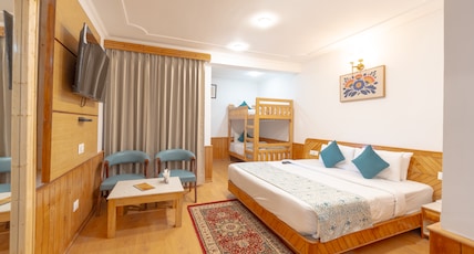 Snow Peak Retreat & Cottages (Centrally Heated- Hill View) Room Type - Family Room (Triple bedded) Air Conditioned-Centrally Heated Snow Peak Retreat & Cottages (Centrally Heated- Hill View) Room Type - Family Room (Triple bedded) Air Conditioned-Centrally Heated