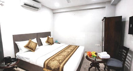 Hotel White Stone Room Type - Deluxe AC Room With Smart TV-Free Wi-Fi