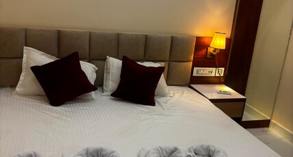 Asusss International Room Type - EXICUTIVE DOUBLE BED ROOM WITH BABY KITCHEN