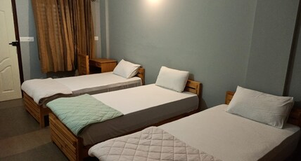 Beach Residency Room Type - Deluxe Triple Room with AC