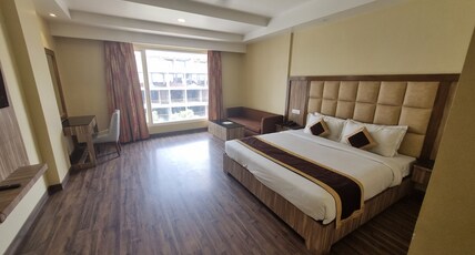 Tulip Tree Hotel Room Type - Deluxe Double Bed Room(Railway Station or Helipad or Banganaga Drop only)