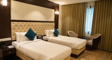 The Ocean Pearl Time Square Udupi Room Type - Deluxe Twin Bed