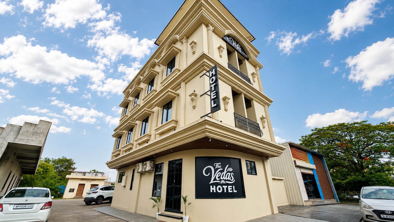 The Veda's Hotel - Tap to explore photos
