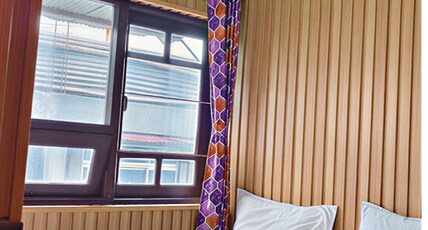 Flavors Nest Room Type - Side view double bed room