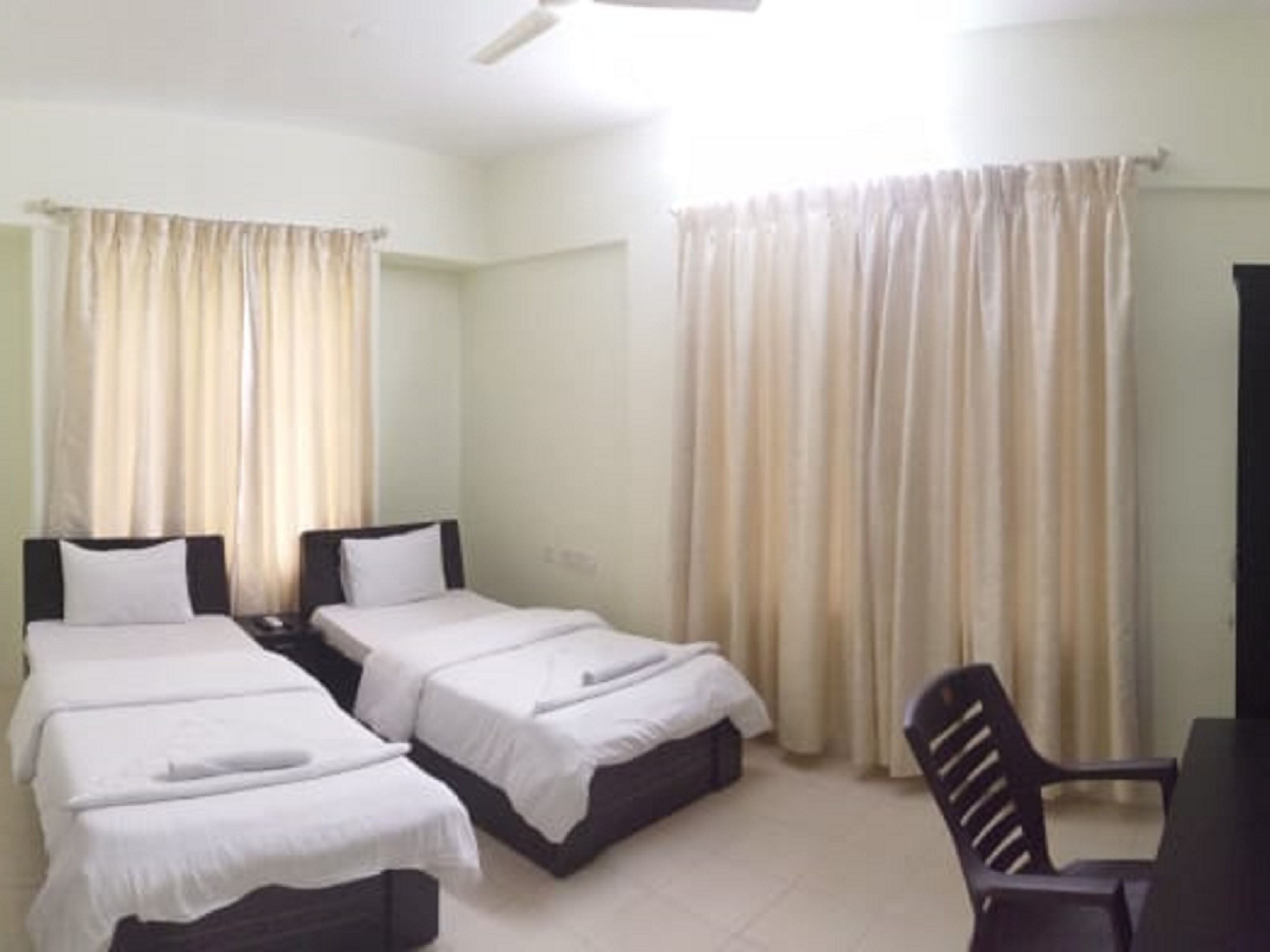BFL Guest House Pune - Alfa Premio - Tap to explore photos