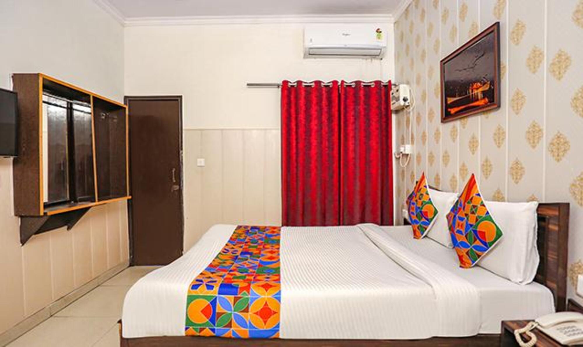 FabHotel Limewood - Tap to explore photos