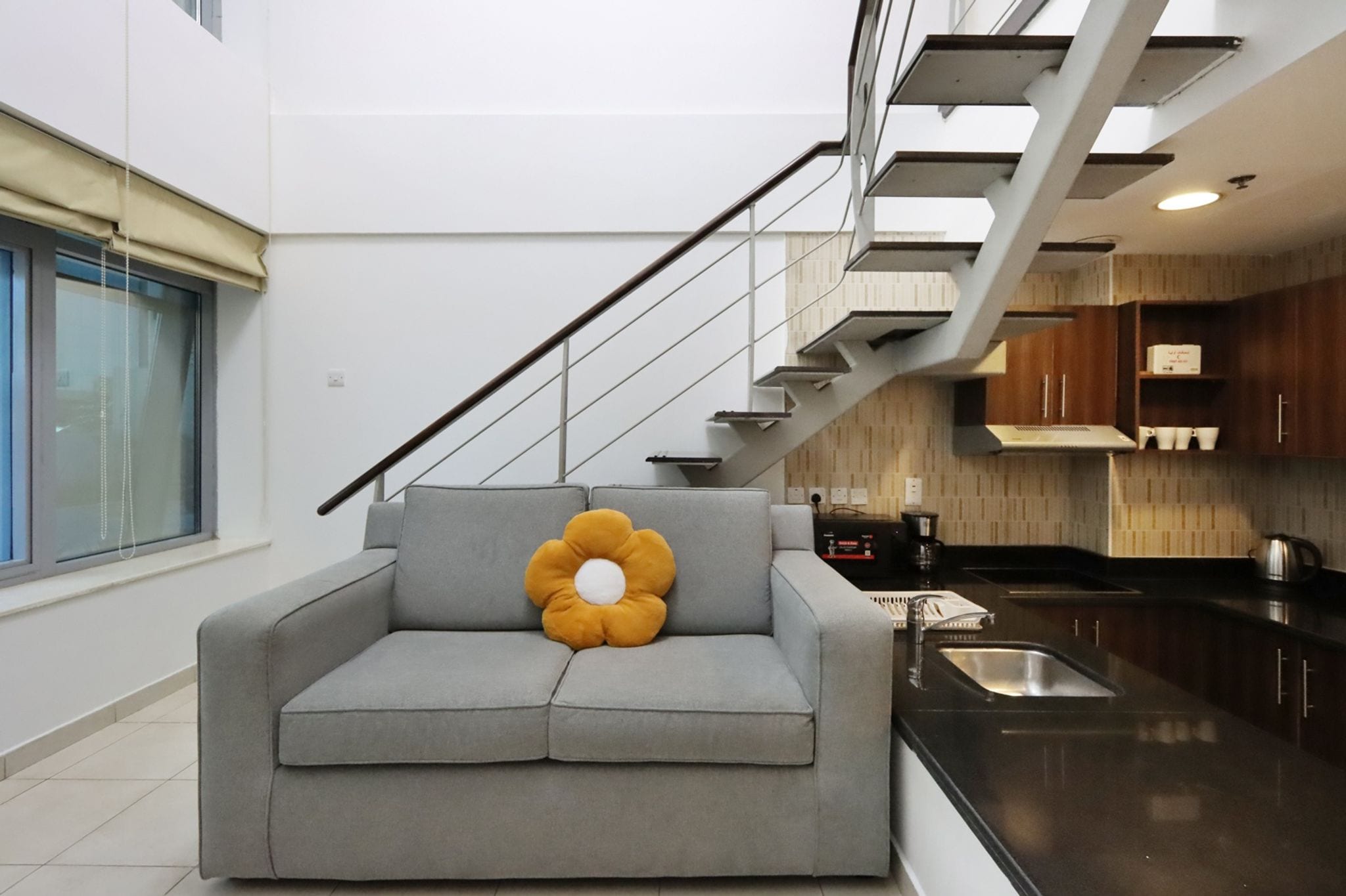 ELIVAAS Curated Convenient Loft Type 1B, Dubai Sports City - Tap to explore photos