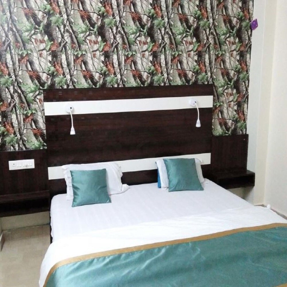 Inn Residency | AC Rooms & Wifi - Tap to explore photos