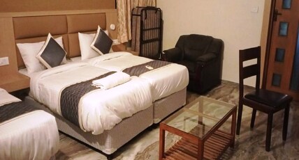 NESTLAY ROOMS AMBATTUR. Room Type - Premium Room