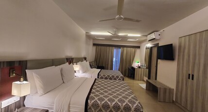Pramod Convention & Beach Resort Room Type - Family Room (Pool View) With Balcony
