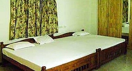 Metro Altis Lodge Room Type - Four Bed Room AC