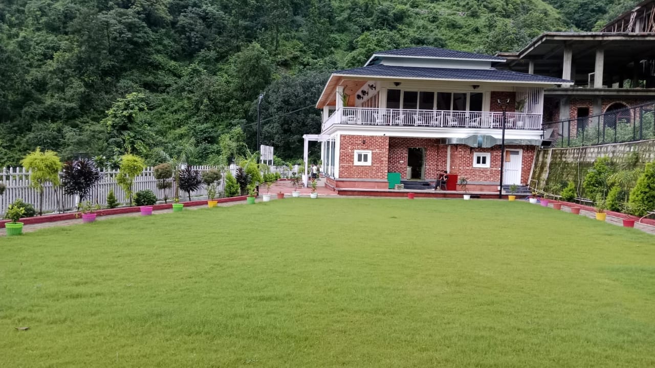 The Whispering Winds Resort - Tap to explore photos