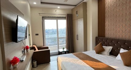 Hotel Pratishtha Room Type - Deluxe and Super Deluxe Room with Balcony and Mountain View Hotel Pratishtha Room Type - Deluxe and Super Deluxe Room with Balcony and Mountain View