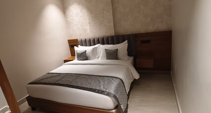 PAVULURI HOTELS Room Type - Deluxe Room