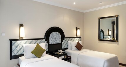Discovery Kartika Plaza Hotel Room Type - Deluxe Pool View with Twin Bed Discovery Kartika Plaza Hotel Room Type - Deluxe Pool View with Twin Bed