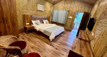 Bamboo garden cottages and cafe Room Type - Deluxe Cottage