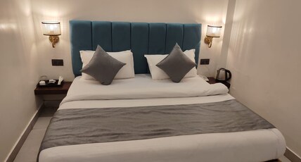 Gulmohar green lawn Room Type - De luxe