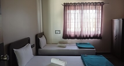 HONNASIRI RESIDENCY Room Type - 2 BED AC ROOM