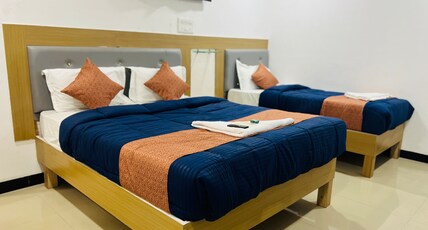 Hotel Jazz  Near T2 Mumbai International Airport Room Type - Family Room with Queen Bed and Single Bed