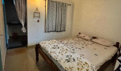 Palm Breeze Gokarna. Room Type - Double Room with Balcony