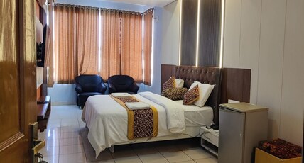 Hotel Rajsangam International Room Type - Deluxe AC Room with Balcony