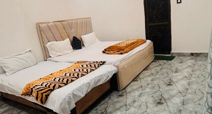 Jaitly P Guest House | Near Ganga Dwar Kashi Vishwanath Room Type - Family Room With Ganga View 
