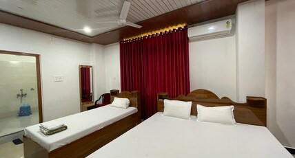 Raimona Residency Room Type - Triple Bedroom - AC