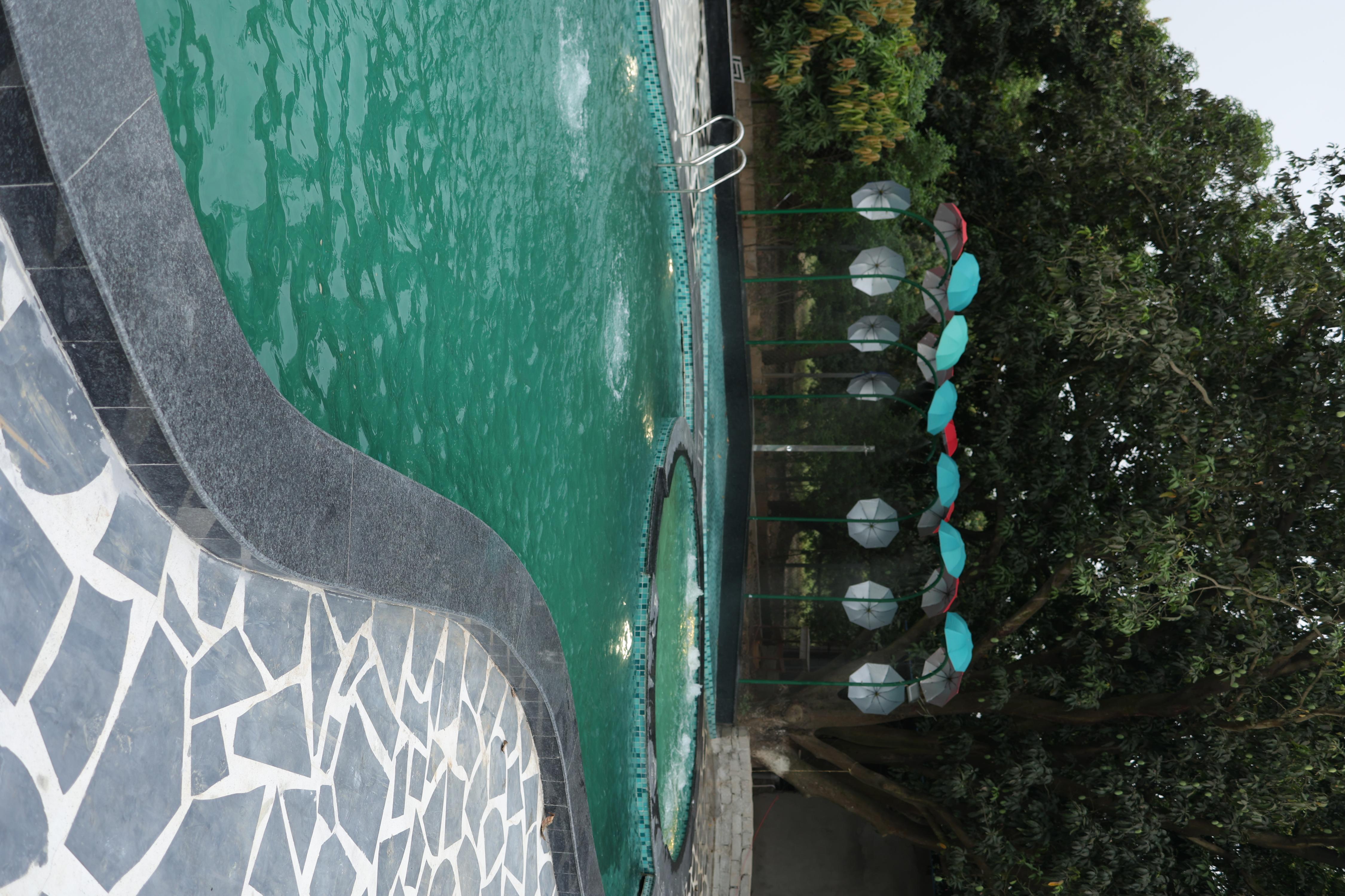 Aamravan Resort - Tap to explore photos