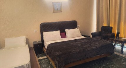 HOTEL LALITA PALACE Room Type - Triple Bed AC Deluxe Room