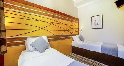 OYO Vegas Hotel Room Type - Standard Twin Room